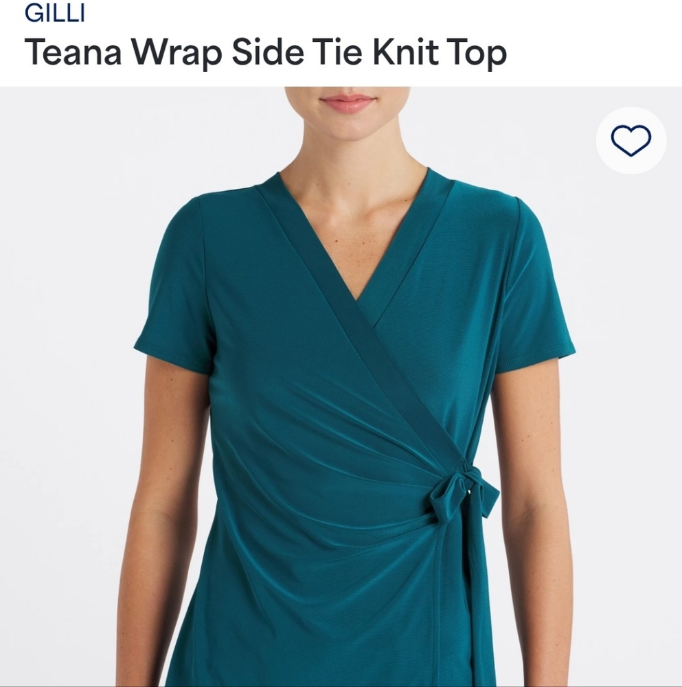 Flattering and sexy wrap around shirt. NWOT